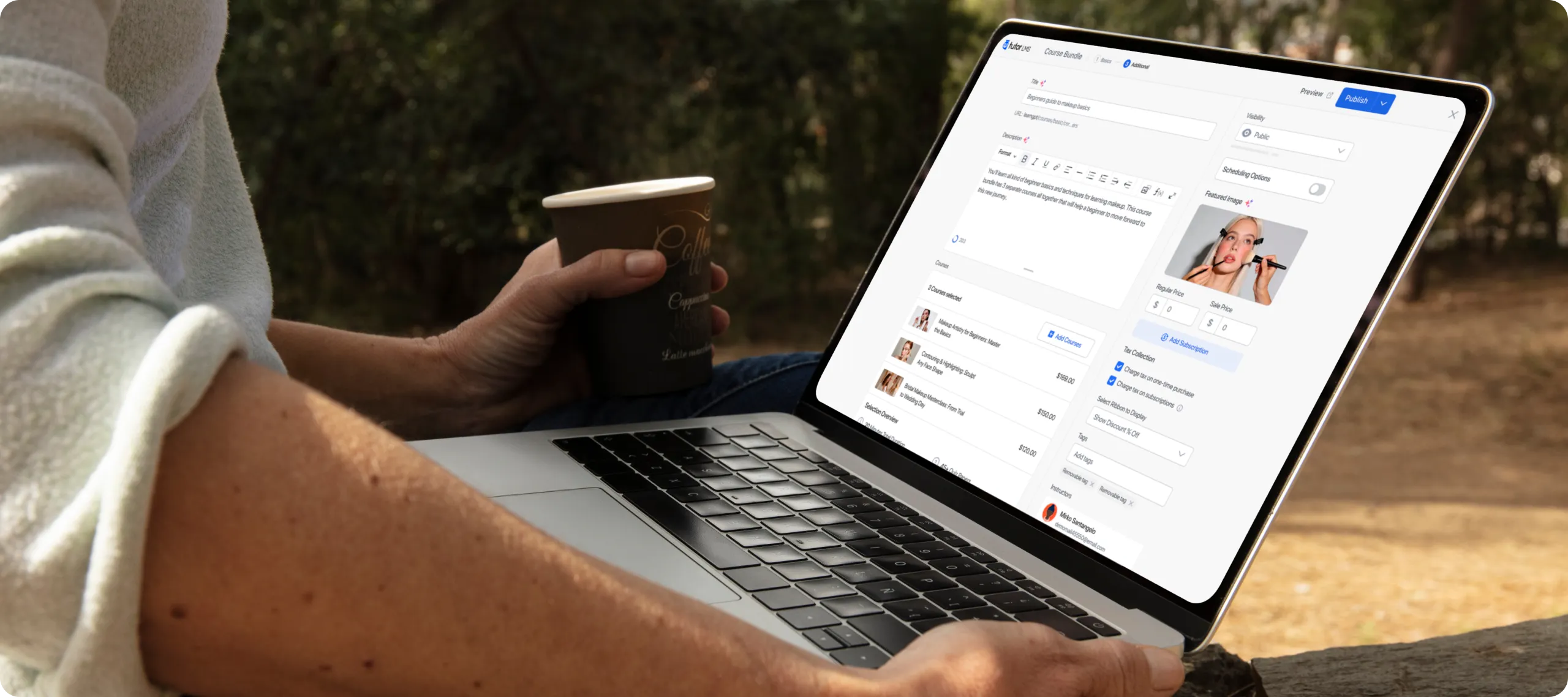 Man building course bundle on laptop outdoors with a cup of coffee on hand