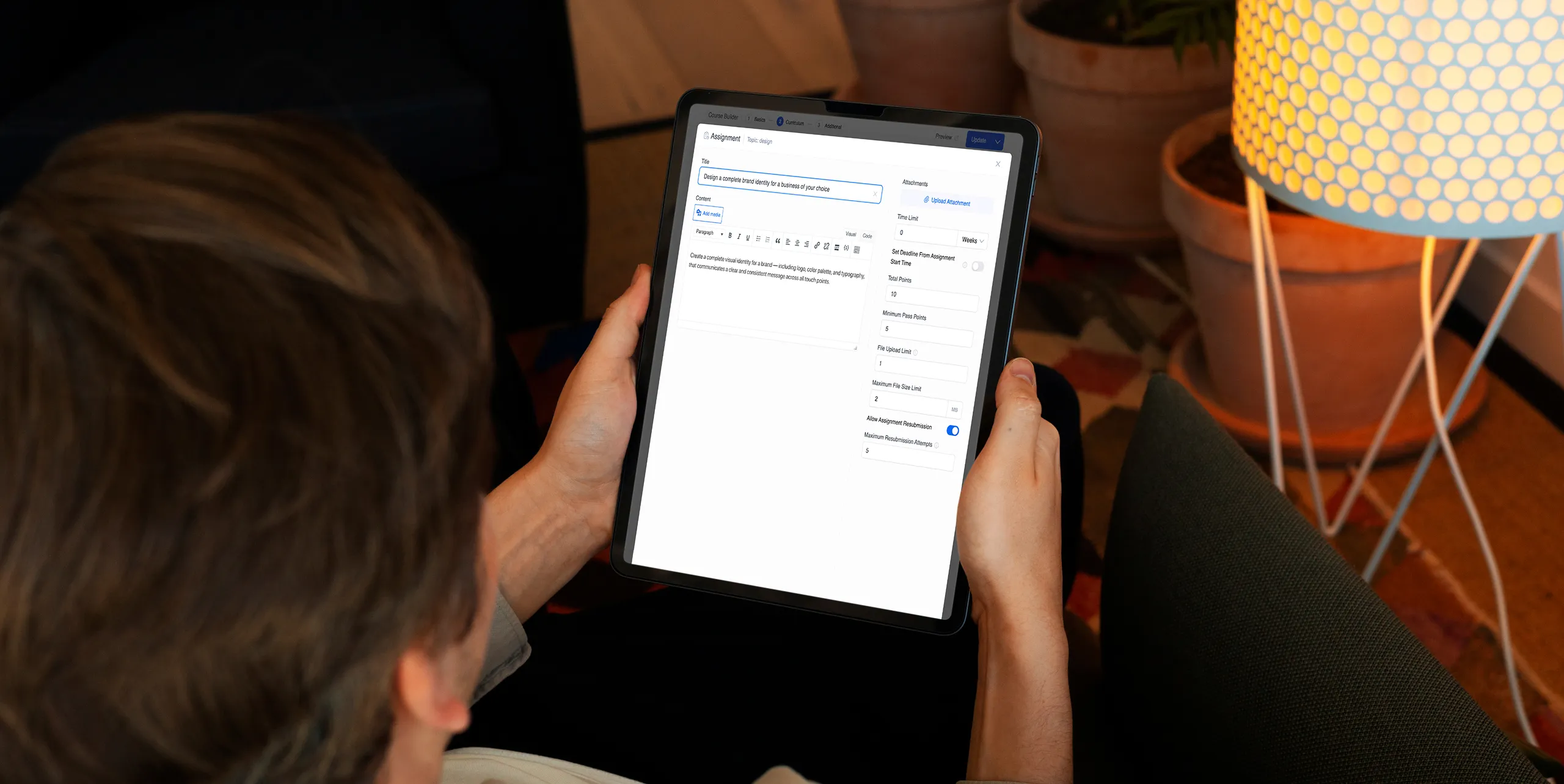 Person viewing assignment form on tablet device