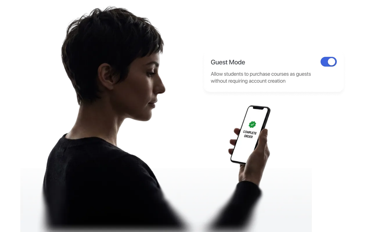 a-woman-holding-a-phone-with-a-completed-order-screen-alongside-a-guest-mode-toggle-switched-on